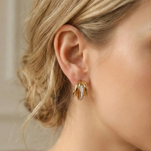 Elegant gold C-shaped earrings for women with triple-row design and pave-set zircons
