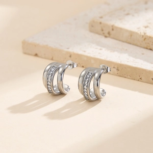 Silver C-shaped stainless steel earrings with square cubic zirconia in minimalist style