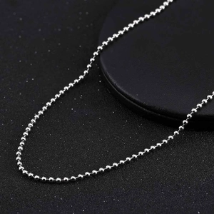 Polished 925 sterling silver 2.0mm bead chain necklace on a black textured background