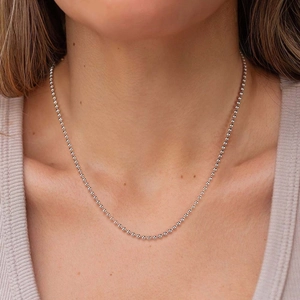 Minimalist S925 sterling silver 2.5mm ball chain necklace shown on a model neck