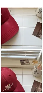 Dettaglio del ricamo 3D su un cappellino da baseball in cotone bordeaux lavato