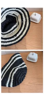 Detail view of foldable striped straw sun hat showing fine crochet texture and inner sweatband