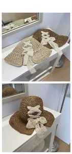 Close-up of beige and brown straw sun hats featuring elegant lace bow decorations