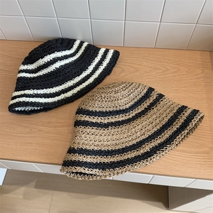 Striped woven straw sun hats for women in khaki and black with a wide-brim foldable design