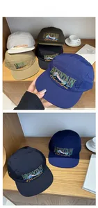 Detail showing embroidered Mountain Adventure logo on a five-panel quick-dry nylon cap