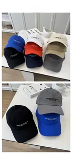 Detail view of lightweight quick-dry baseball caps in multiple colors with embroidery