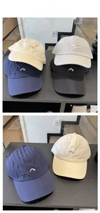 Detail view showing textured quick-dry fabric and embroidered logo of the baseball cap