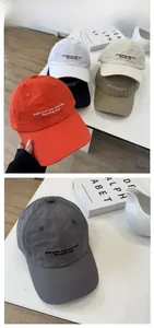Flat lay of quick-dry baseball caps in multiple colors with Running Club embroidery