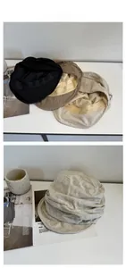 Detailansicht atmungsaktiver Schirmmützen aus Baumwolle und Leinen in Schwarz, Beige und Grau
