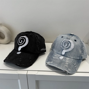 Distressed denim baseball caps with spiral embroidery in black and light blue vintage style