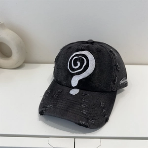 Distressed black denim baseball cap with question mark embroidery on white background
