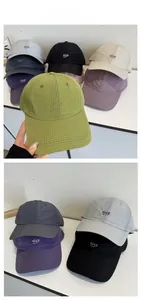 Detail of the quick-dry grid fabric and 'Nice' letter embroidery on multi-color baseball caps