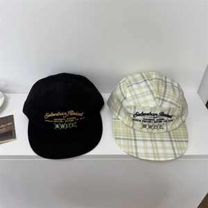 Set of two vintage street style camp caps in black and light green checkered canvas