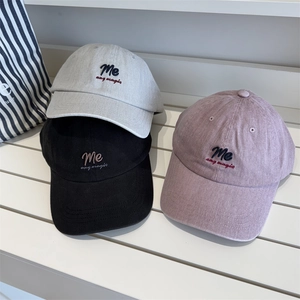 Classic plaid baseball cap in cotton twill featuring 'Me any magic' embroidery for casual style