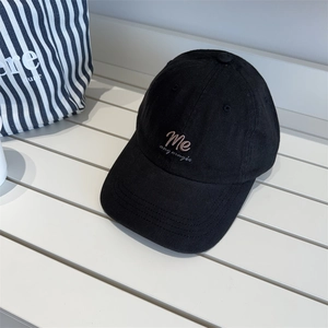 Classic black cotton baseball cap with pink 'Me my magic' embroidery and vintage style