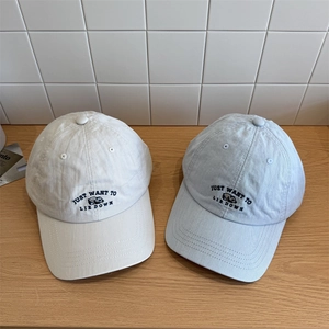 Cute panda embroidered baseball caps in beige and blue with soft cotton twill texture