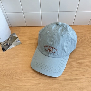 Light blue cotton baseball cap featuring cute bear embroidery and 'JUST WANT TO LIE DOWN' text