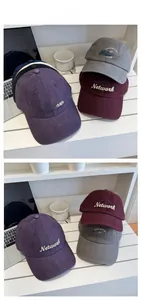 Detailed view of corduroy baseball caps with premium Network 3D letter embroidery