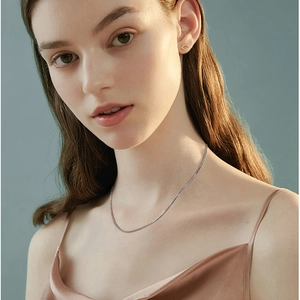 Minimalist 1.6mm S925 sterling silver chain and petite diamond stud earrings on model