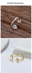 Detalle macro del sello S925 en anillo abierto con dos circonitas de gota