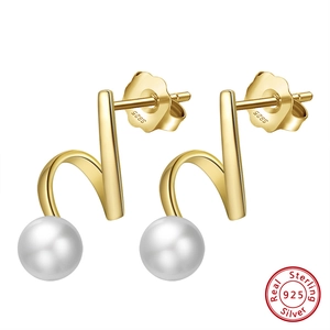 Minimalist 925 sterling silver gold earrings featuring natural white baroque pearls