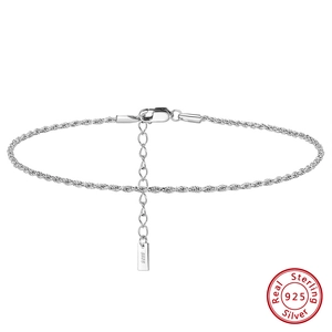 Detailed macro view of S925 sterling silver rope anklet chain with lobster clasp