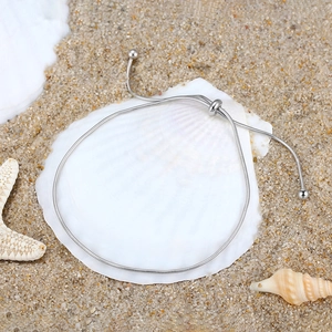 Adjustable S925 sterling silver 1.2mm snake chain anklet with smooth beads on seashell beach