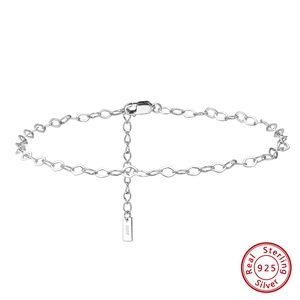 Detail of S925 sterling silver anklet showing heart-shaped links and hallmark tag
