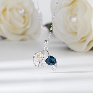 Cute elephant pendant necklace with blue crystal and pave cubic zirconia in silver