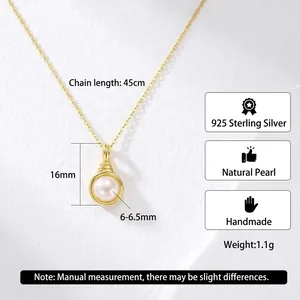 925 sterling silver necklace with natural pearl pendant on white ripple background