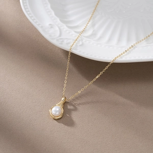 Minimalist 925 sterling silver necklace featuring white pearl pendant on a gold O-chain