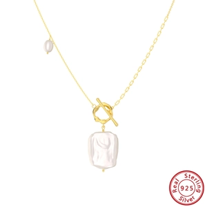 Baroque pearl necklace in 925 sterling silver with golden asymmetric chain and OT buckle