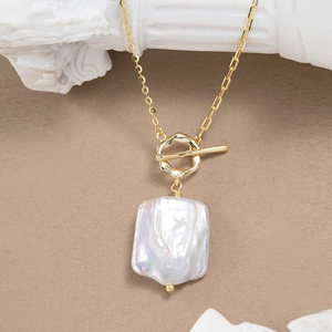 925 silver gold chain necklace with square baroque pearl and OT toggle on white pillar