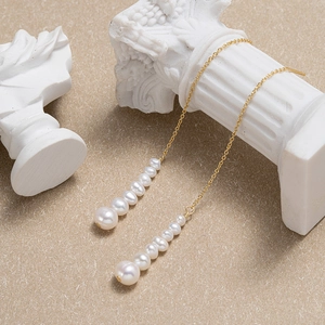 Elegant 925 sterling silver drop earrings with graduated natural freshwater pearls