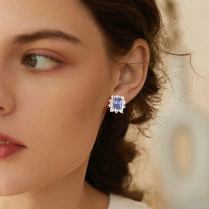 Elegant S925 silver flower stud earrings with a rectangular blue zircon stone for women