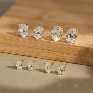 Elegant oval-cut zircon stud earrings in gold plated S925 silver with a brilliant fire