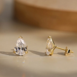 Elegant gold S925 sterling silver teardrop stud earrings with sparkling 8A cubic zirconia