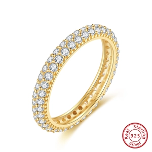 Macro shot of 925 sterling silver ring with triple-row micro-pave cubic zirconia stones