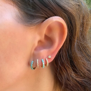 Detailed view of S925 sterling silver hoop earrings set with turquoise and white zircon