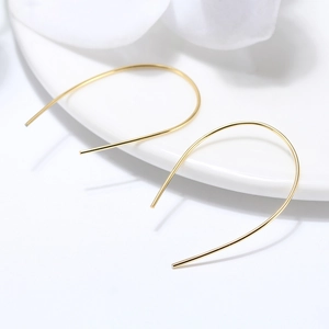 Minimalist irregular S925 silver earrings with polished golden U-shaped geometric arcs