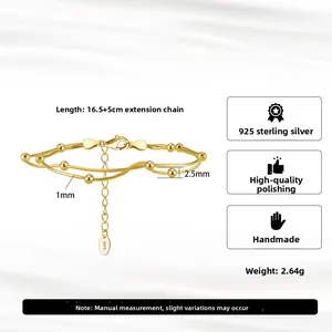 Macro view of gold S925 sterling silver double-layer bead chain bracelet with extension