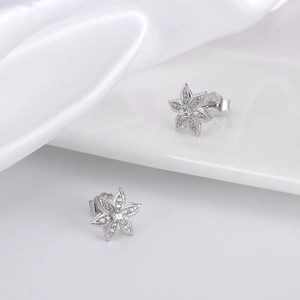 Elegant S925 sterling silver flower stud earrings with shimmering zircon pavé petals