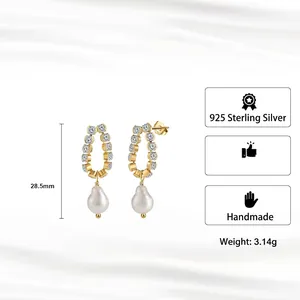 Handmade 925 sterling silver horseshoe earrings with cubic zirconia and baroque pearls