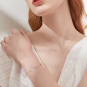 Minimalist 14K gold plated 925 sterling silver bracelet with four round freshwater pearls