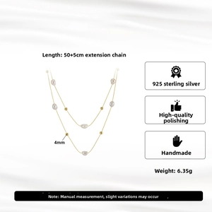 Collana a doppio strato in argento 925 con perle d'acqua dolce e sfere dorate