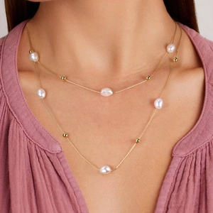 Collana a doppio strato in argento 925 dorato con perle barocche e sfere d'oro