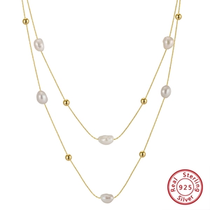 Collana doppia catena in argento 925 dorato con ciondoli di perle d'acqua dolce naturali