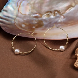 925 silver gold hoop earrings featuring natural freshwater pearls and golden bead accents