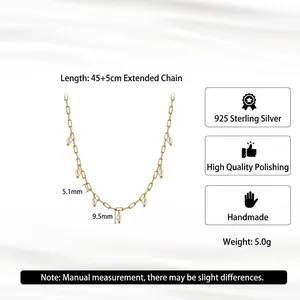 14K gold plated 925 sterling silver necklace with freshwater pearls on white fabric