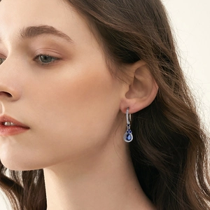 Elegant S925 sterling silver drop earrings featuring pear-cut blue sapphire and zircons
